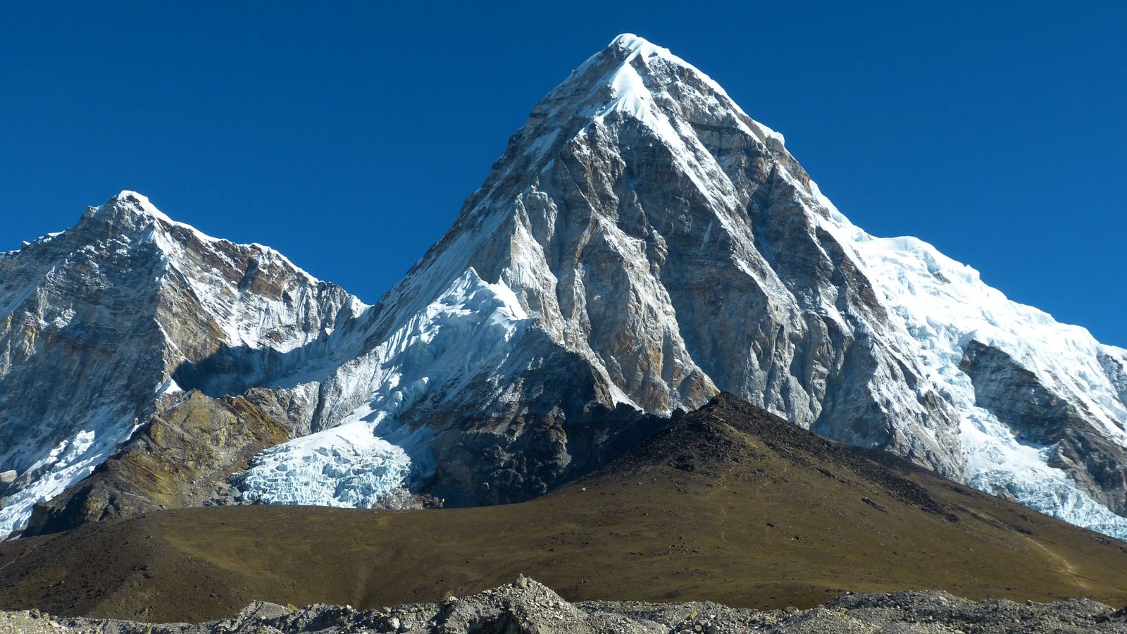 Kala Patthar viewpoint at 5,545 m with Mount Pumori in the background, offering panoramic Himalayan scenery near Everest Base Camp