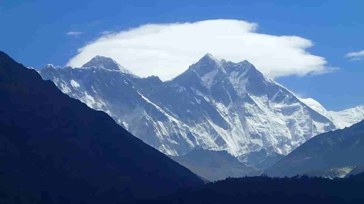 Everest visible along Namche route just beyond Namche Bazar