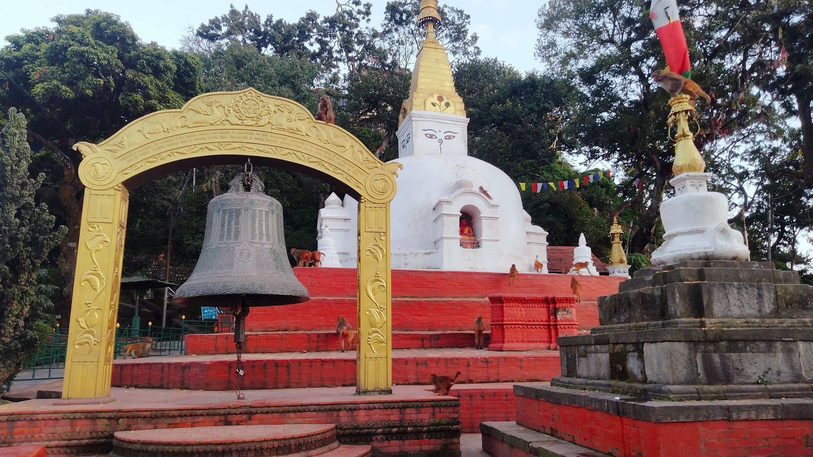 Swayambhunath sunset silhouette of stupa and prayer flags