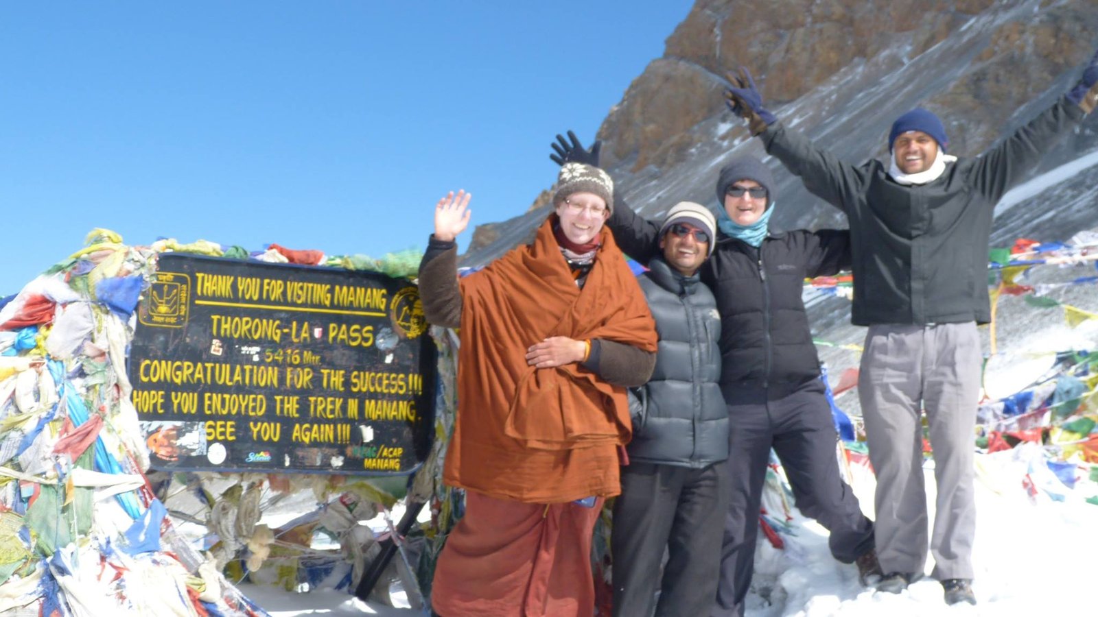 Thorong La Pass on the Annapurna Circuit Trek – panoramic Himalayan views, snow-covered trails, high mountain adventure, and iconic trekking route in Nepal.
